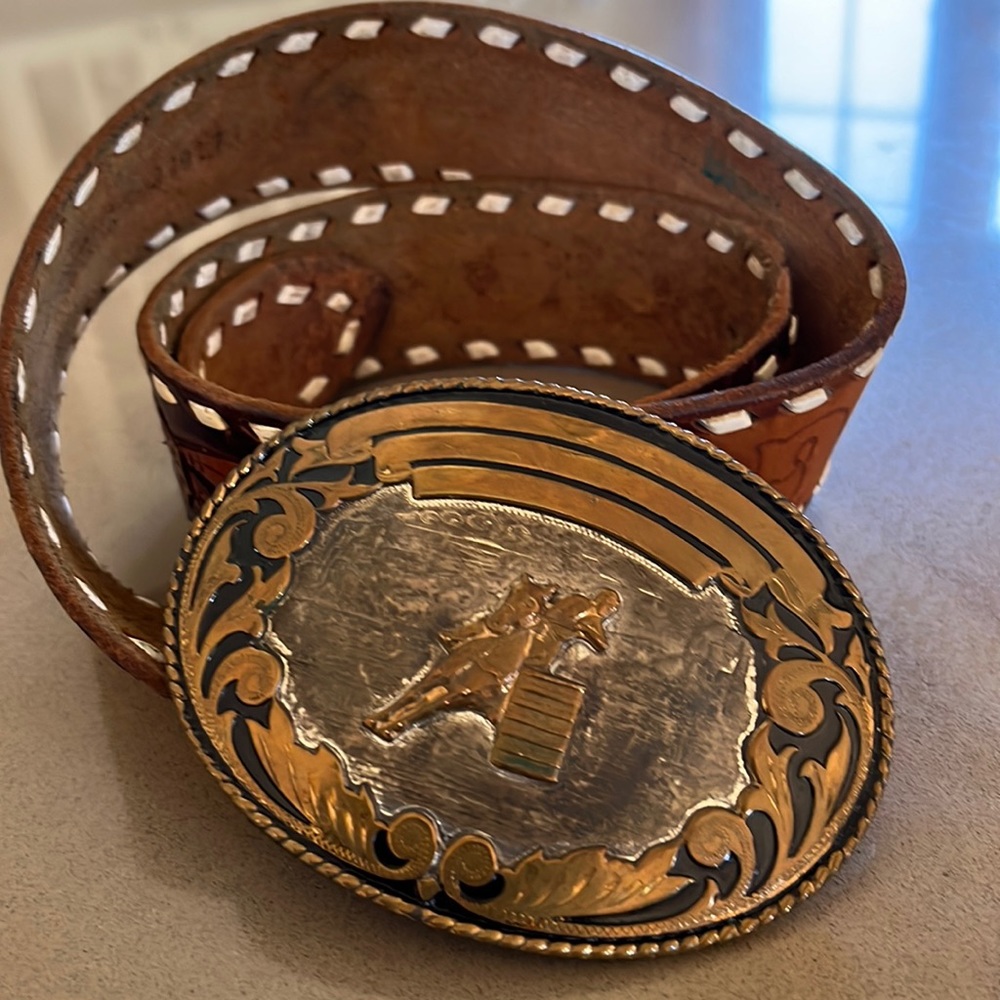 Vintage Comstock silversmiths buckle with custom made hand laced leather belt